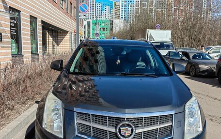 Cadillac SRX II рестайлинг, 2011 год, 1 100 000 рублей, 12 фотография