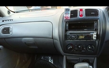 Mazda Familia, 1999 год, 210 000 рублей, 9 фотография