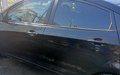 Hyundai Solaris II рестайлинг, 2013 год, 630 000 рублей, 11 фотография