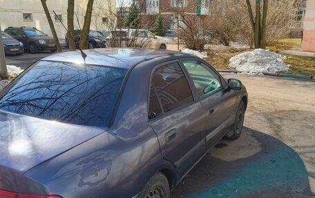 Mitsubishi Carisma I, 2001 год, 70 000 рублей, 24 фотография