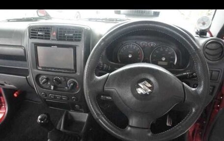 Suzuki Jimny, 2012 год, 640 000 рублей, 10 фотография