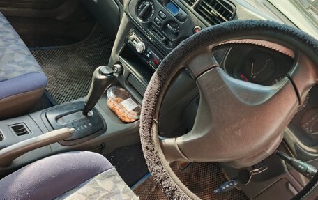 Mitsubishi Mirage VI рестайлинг, 1996 год, 133 000 рублей, 3 фотография