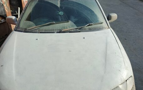 Mitsubishi Mirage VI рестайлинг, 1996 год, 133 000 рублей, 9 фотография