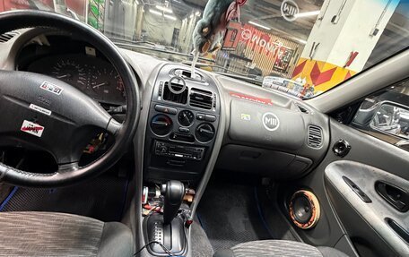 Mitsubishi Carisma I, 1997 год, 300 000 рублей, 9 фотография