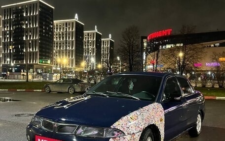 Mitsubishi Carisma I, 1997 год, 300 000 рублей, 2 фотография