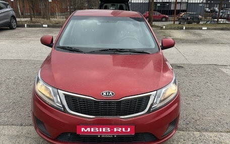 KIA Rio III рестайлинг, 2012 год, 750 000 рублей, 17 фотография
