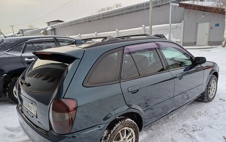 Mazda Familia, 1999 год, 310 000 рублей, 8 фотография