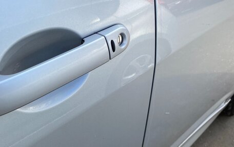 Nissan Tiida, 2012 год, 830 000 рублей, 23 фотография