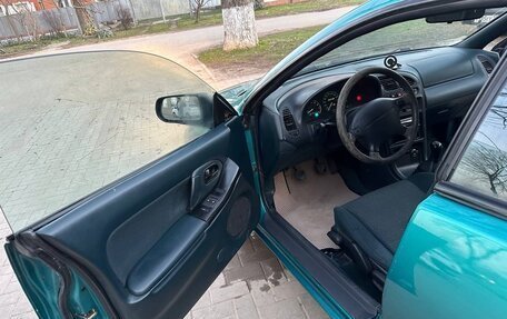 Mazda 323, 1996 год, 350 000 рублей, 9 фотография