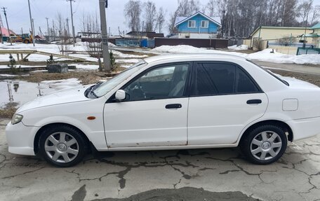 Mazda Familia, 2002 год, 230 000 рублей, 4 фотография
