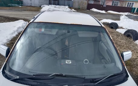 Mazda Familia, 2002 год, 230 000 рублей, 14 фотография