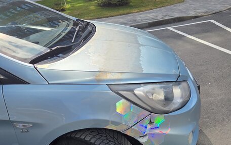 Hyundai Solaris II рестайлинг, 2011 год, 560 000 рублей, 19 фотография