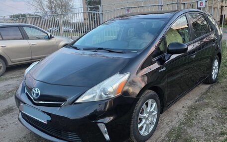 Toyota Prius v (+) I (ZVW40/41) рестайлинг, 2014 год, 1 590 000 рублей, 1 фотография