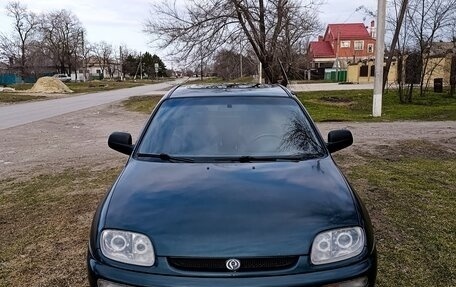 Mazda 323, 1994 год, 249 000 рублей, 2 фотография