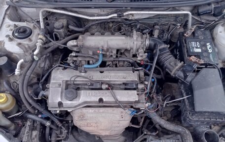 Mazda Familia Y11, 2001 год, 250 000 рублей, 10 фотография