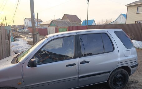 Toyota Raum I, 1998 год, 240 000 рублей, 1 фотография