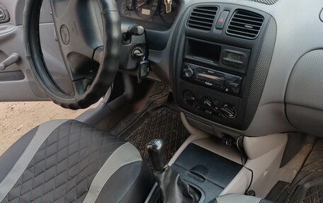 Mazda 323, 1998 год, 190 000 рублей, 17 фотография