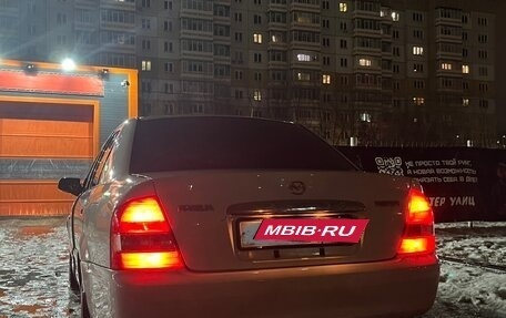 Mazda Familia, 2002 год, 400 000 рублей, 3 фотография