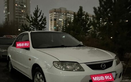 Mazda Familia, 2002 год, 400 000 рублей, 2 фотография