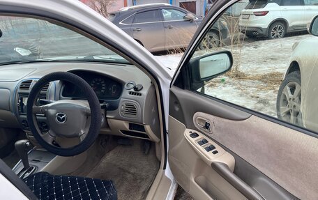 Mazda Familia, 2002 год, 400 000 рублей, 12 фотография