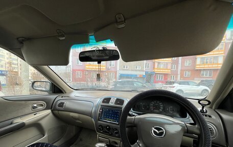 Mazda Familia, 2002 год, 400 000 рублей, 13 фотография