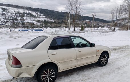 Ford Laser IV, 2000 год, 550 000 рублей, 6 фотография