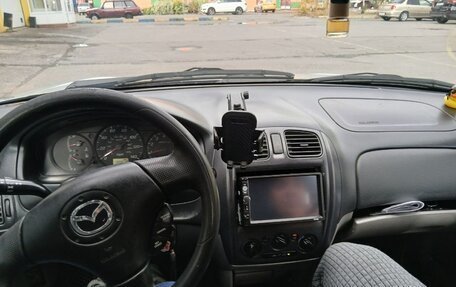 Mazda Protege, 2003 год, 120 000 рублей, 9 фотография