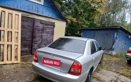 Mazda Protege, 2003 год, 120 000 рублей, 8 фотография