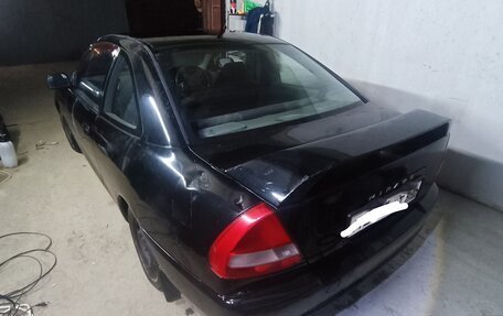 Mitsubishi Mirage VI рестайлинг, 1996 год, 100 000 рублей, 1 фотография