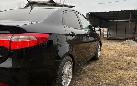 KIA Rio III рестайлинг, 2011 год, 700 000 рублей, 3 фотография