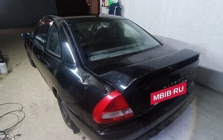 Mitsubishi Mirage VI рестайлинг, 1996 год, 100 000 рублей, 6 фотография