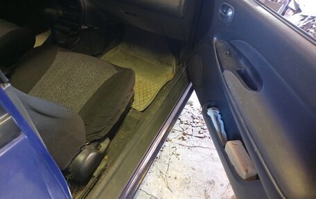 Mazda 323, 1996 год, 190 000 рублей, 25 фотография