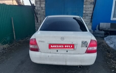 Mazda Familia, 2001 год, 130 000 рублей, 3 фотография