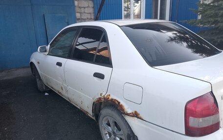 Mazda Familia, 2001 год, 130 000 рублей, 5 фотография