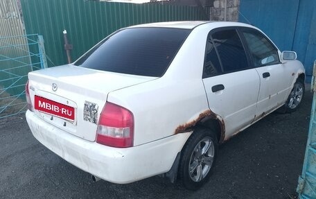 Mazda Familia, 2001 год, 130 000 рублей, 6 фотография