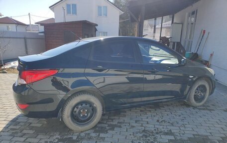 Hyundai Solaris II рестайлинг, 2011 год, 720 000 рублей, 8 фотография