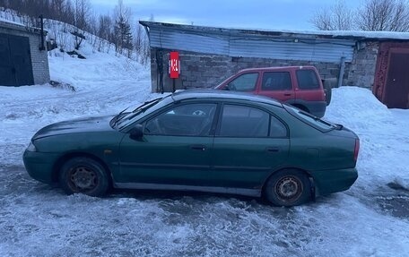 Mitsubishi Carisma I, 1997 год, 60 000 рублей, 3 фотография