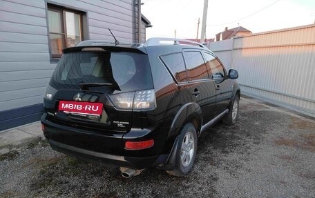 Mitsubishi Outlander III рестайлинг 3, 2007 год, 1 070 000 рублей, 2 фотография