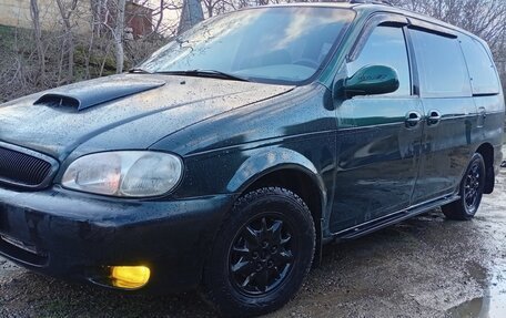 KIA Carnival III, 1998 год, 437 000 рублей, 4 фотография