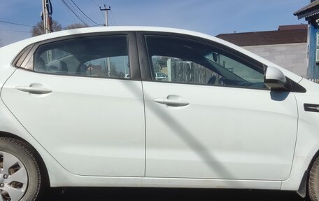 KIA Rio III рестайлинг, 2012 год, 900 000 рублей, 13 фотография