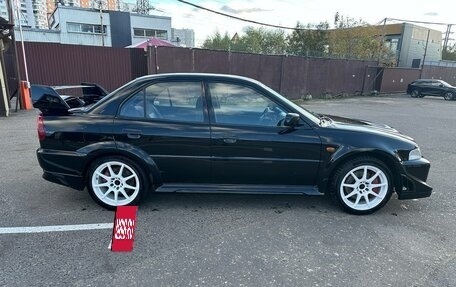 Mitsubishi Lancer VII, 1997 год, 1 500 000 рублей, 6 фотография
