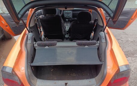 Opel Tigra, 1997 год, 250 000 рублей, 9 фотография