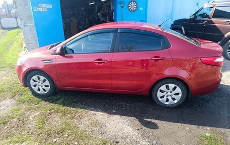 KIA Rio III рестайлинг, 2012 год, 700 000 рублей, 3 фотография