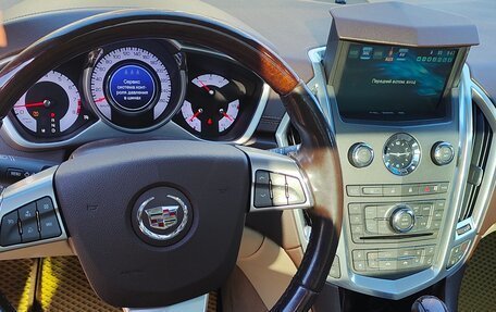 Cadillac SRX II рестайлинг, 2011 год, 1 390 000 рублей, 18 фотография