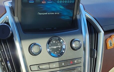 Cadillac SRX II рестайлинг, 2011 год, 1 390 000 рублей, 23 фотография