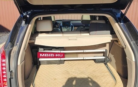 Cadillac SRX II рестайлинг, 2011 год, 1 390 000 рублей, 26 фотография