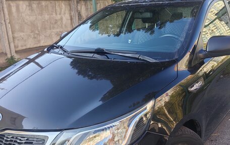 KIA Rio III рестайлинг, 2012 год, 750 000 рублей, 2 фотография