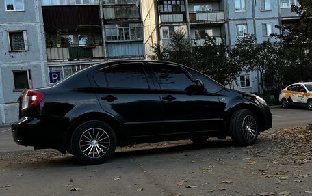 Suzuki SX4 II рестайлинг, 2010 год, 700 000 рублей, 11 фотография