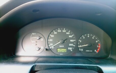 Mazda 323, 1998 год, 170 000 рублей, 14 фотография