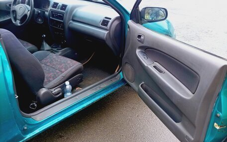 Mazda 323, 1998 год, 170 000 рублей, 10 фотография